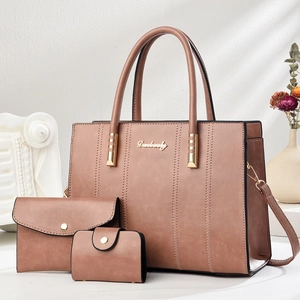 Elegant 3-piece mauve PU leather tote bag set with quilted texture and gold hardware