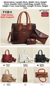 Close-up of three-piece crocodile pattern tote bag set including handbag and pouches