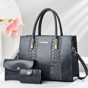 Three-piece black large capacity tote bag set with crocodile texture and golden hardware
