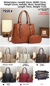 Detail view of large faux leather tote bag with interior compartment and matching pouch