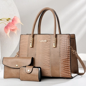 Three-piece brown faux leather bag set with crocodile texture and gold hardware details