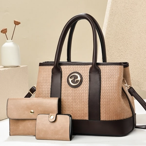 Three-piece women's handbag set featuring embossed textures and contrast patchwork details