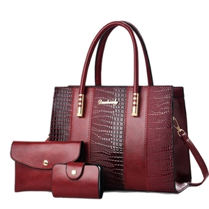 Three-piece set of crocodile embossed dark red tote bag, clutch and card holder