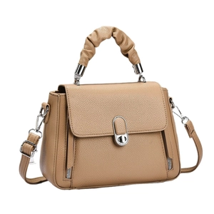 Khaki pebbled leather handbag with pleated cloud handle and adjustable shoulder strap