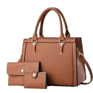 Three-piece brown litchi pattern leather handbag set with geometric embossed detail