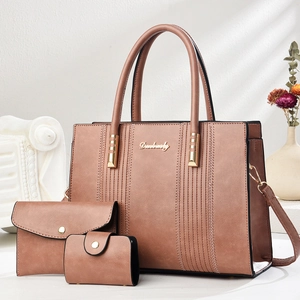Three-piece set including large tote bag, clutch and card holder in vintage pink brown