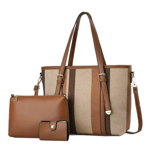 Three-piece canvas tote set with striped pattern and brown faux leather accessories