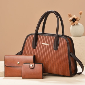 Detailed view of 3-piece striped tote set with golden buckles and textured PU leather