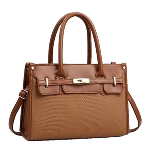 Brown leather tote bag with woven texture, golden hardware and detachable strap