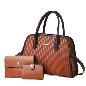 Three-piece brown embossed tote bag set with striped texture and golden metal plaque detail