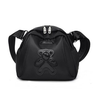 Sac à bandoulière noir en tissu Oxford avec ours à paillettes et large sangle jacquard