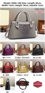 Detail view of crocodile pattern faux leather handbag showing 30x12x18cm dimensions