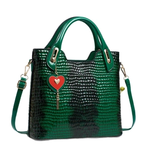 Emerald green stone pattern handbag with red heart pendant and gold hardware