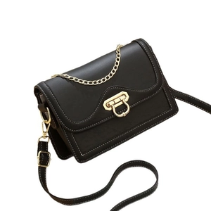 Retro black leather crossbody bag with contrast stitching and golden heart-shaped lock