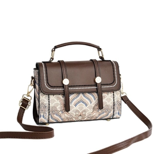 Elegant vintage patchwork handbag featuring brown PU leather and jacquard embroidery patterns