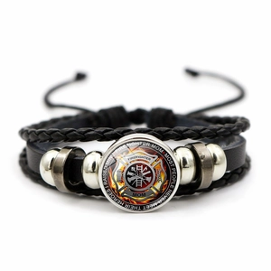 Macro detail of Firefighter Mom leather bracelet with glass cabochon and metal beads