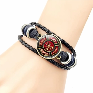 Multilayer leather firefighter rescue bracelet featuring bronze emblem on wrist