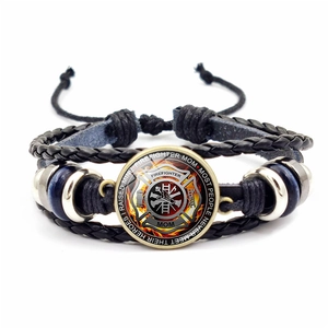 Detail of multi-layer leather braided bracelet with Firefighter Mom glass charm and beads