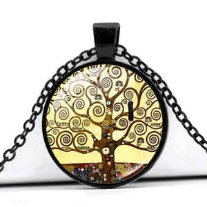 Detail of black alloy necklace featuring Tree of Life art under glass cabochon