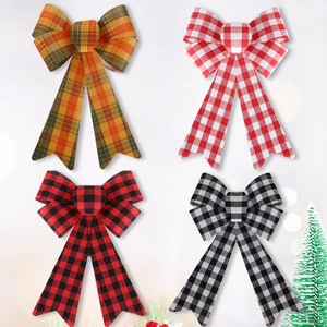 Set of four plaid Christmas bows with long ribbons for holiday tree and gift decoration