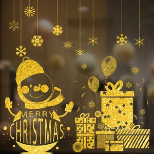 Golden glitter Christmas window stickers set with snowman, snowflakes and gift box motifs