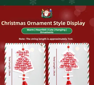 Detail of red and white woven Christmas tree and bell ornaments with bead and bell charms