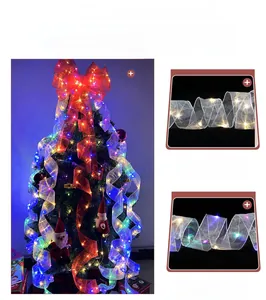 Detail of LED Christmas ribbon with warm and colored lights on mesh fabric