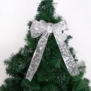 Silver sheer Christmas bow with glitter stars and musical notes for tree decoration