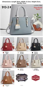 Detailed view of the internal multi-layer storage and zippers of the PU tote bag