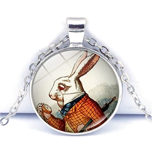 Detailed view of vintage silver Alice in Wonderland white rabbit glass pendant necklace