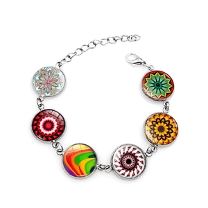 Detailed view of silver mandala charm bracelet with six colorful glass gemstone pendants