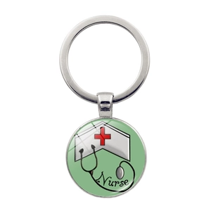 Detailed view of nurse keychain with medical icons and glass dome pendant design