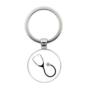 Silver metal keychain featuring a round pendant with a black medical stethoscope icon