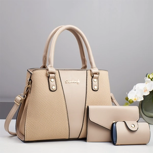 Three-piece beige patchwork tote bag set with elegant woven texture and metal logo
