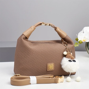 Brown woven texture crossbody bag with top handles and a cute plush doll charm pendant