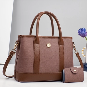 Ensemble sac cabas en toile marron avec détails floraux dorés et portefeuille assorti