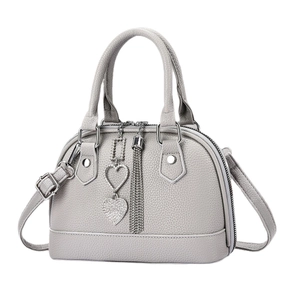 Gray lychee textured shell handbag with heart charms and adjustable shoulder strap