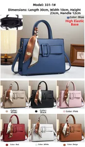 Detailed view of women's tote bag size 30x10x23cm with structure and silk scarf detail