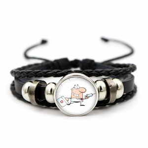 Close-up of handmade multilayer leather bracelet featuring a cartoon doctor glass cabochon
