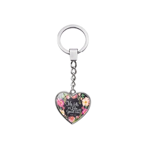 Silver heart keychain with flower pattern and He fills My Life with GOOD THINGS text