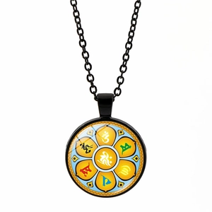Detailed close-up of Buddhist Om Mani Padme Hum mantra pendant with colorful lotus pattern