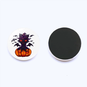 Detail view of round Halloween pumpkin and black cat magnetic glass refrigerator stickers