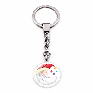 Detail of Santa Claus glass dome keychain with polished silver metal ring and chain