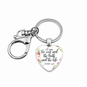 Detail of silver heart keychain with Bible verse John 14:6 and floral accents