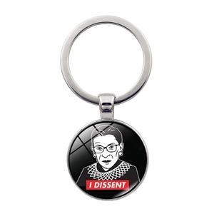 Detail of RBG keychain with I DISSENT slogan and Ruth Bader Ginsburg portrait charm