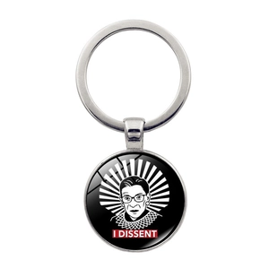 Macro detail of RBG Ruth Bader Ginsburg I Dissent glass cabochon silver keychain