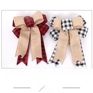 Detail of buffalo plaid Christmas bow ornaments with buffalo check and burlap textures