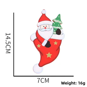Close-up of Santa Claus ornament with 14.5cm size markings and Christmas tree motif
