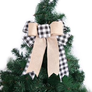 Christmas tree topper bow with buffalo plaid and burlap layers for festive home decor