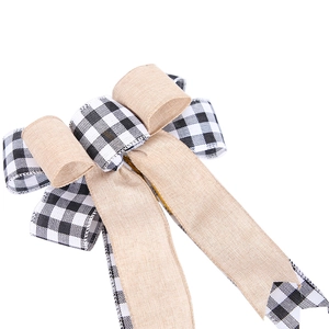 Christmas tree bow with black-and-white buffalo plaid and natural burlap textures